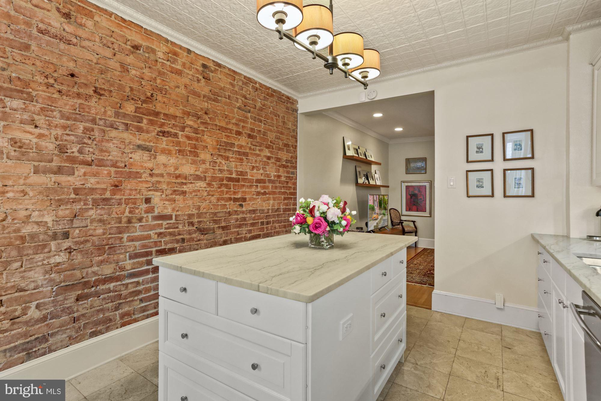 3402 Dent Place Northwest Washington, DC 20007 - Photo 3 of 15 Exposed brick wall