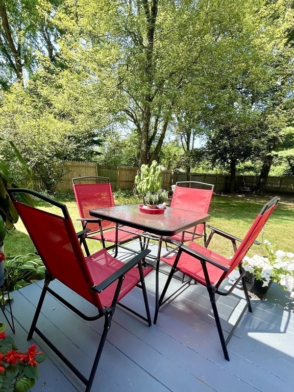 1107 Allen Street Springfield, MA 01118 - Photo 12 of 16 an outdoor sitting area with chairs and table in the outdoor