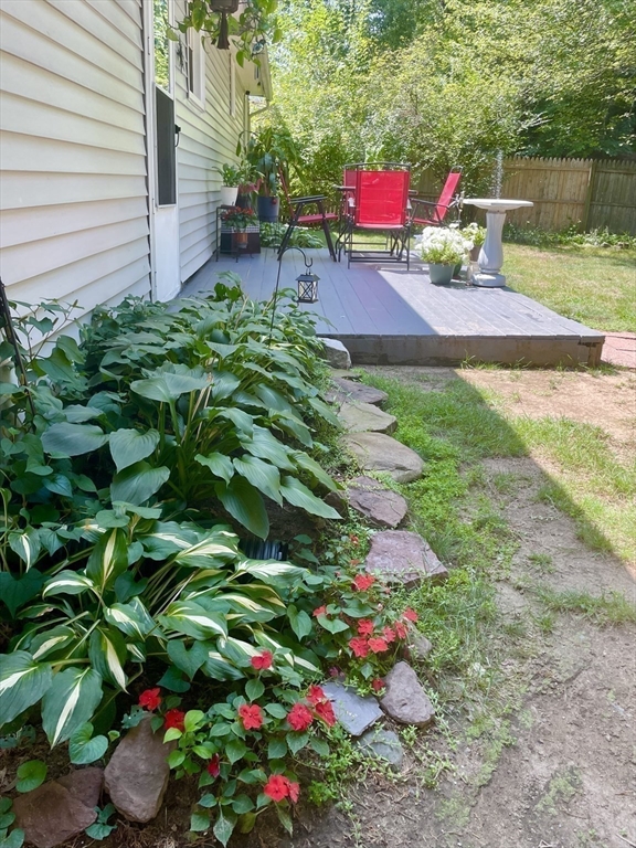 1107 Allen Street Springfield, MA 01118 - Photo 13 of 16 a backyard of a house with a yard and fountain