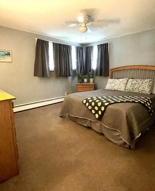 1107 Allen Street Springfield, MA 01118 - Photo 9 of 16 a bedroom with a bed and window