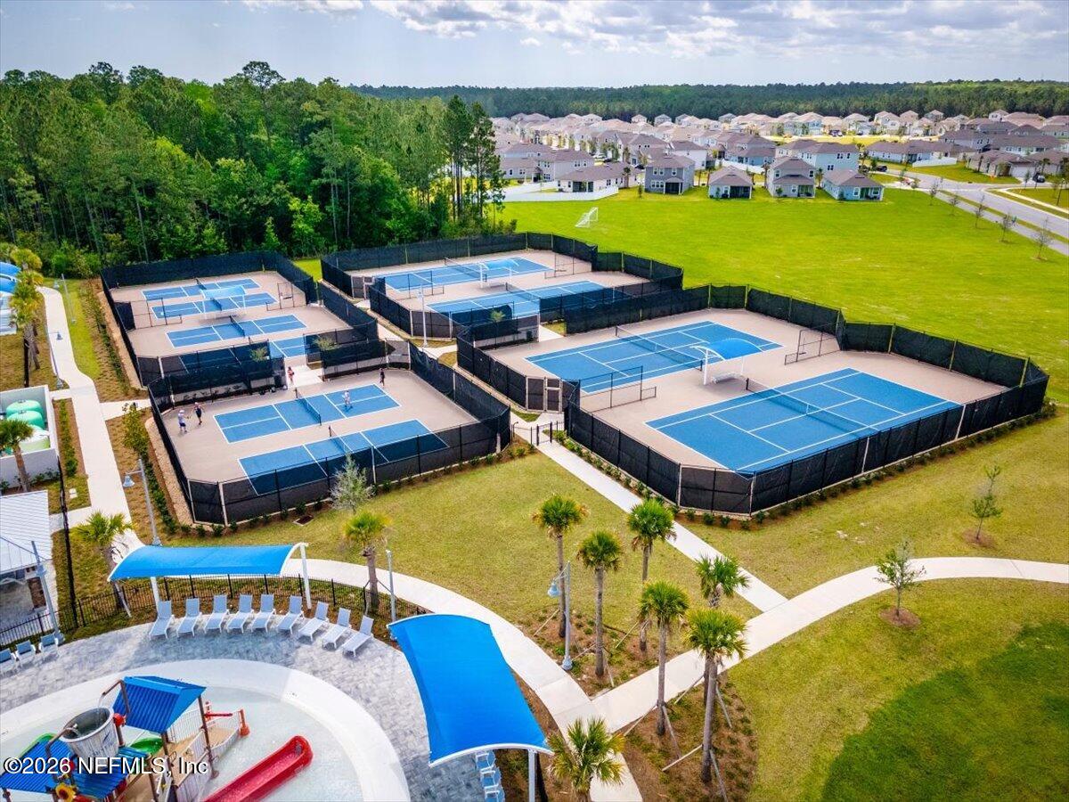 55 Seton Court St. Augustine, FL 32092 - Photo 17 of 20 a view of an swimming pool with a patio