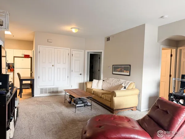 a living room with furniture and a couch