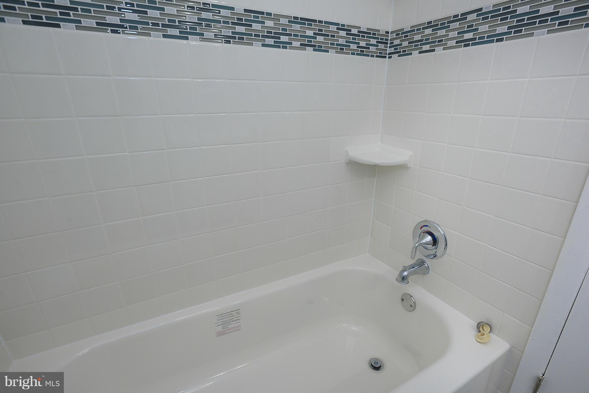 12010 Bluhill Road Silver Spring, MD 20902 - Photo 20 of 30 Bathroom with Updated Tiling