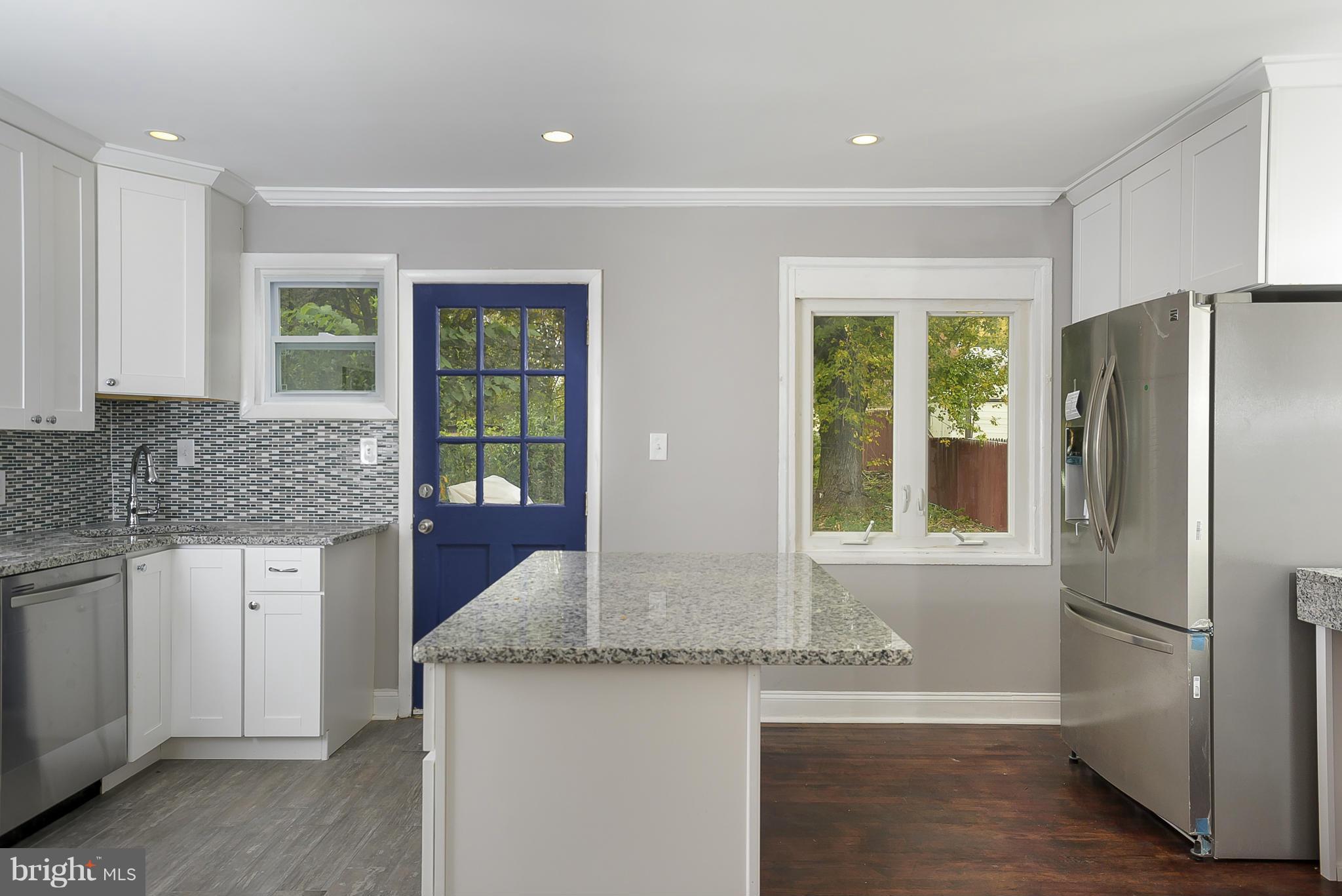 12010 Bluhill Road Silver Spring, MD 20902 - Photo 7 of 30 Updated Kitchen with Stainless Steel Appliances