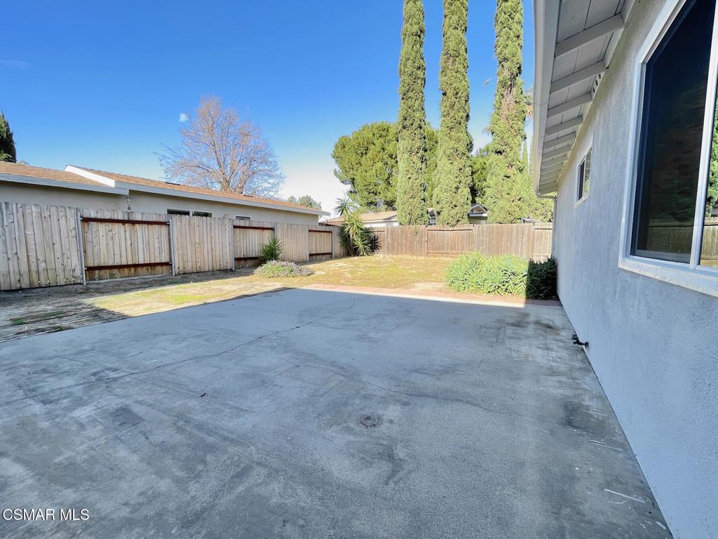 4881 Muirwood Court Simi Valley, CA 93063 - Photo 22 of 32 a view of a swimming pool with an outdoor space and seating area