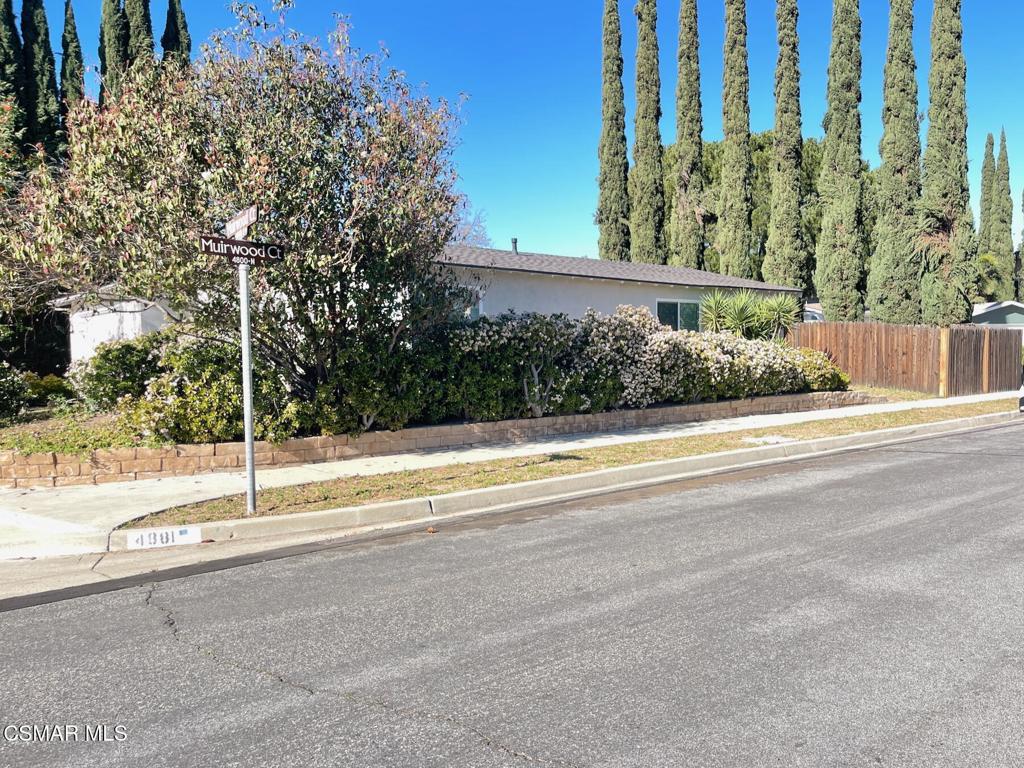 4881 Muirwood Court Simi Valley, CA 93063 - Photo 28 of 32 a view of a house with a street