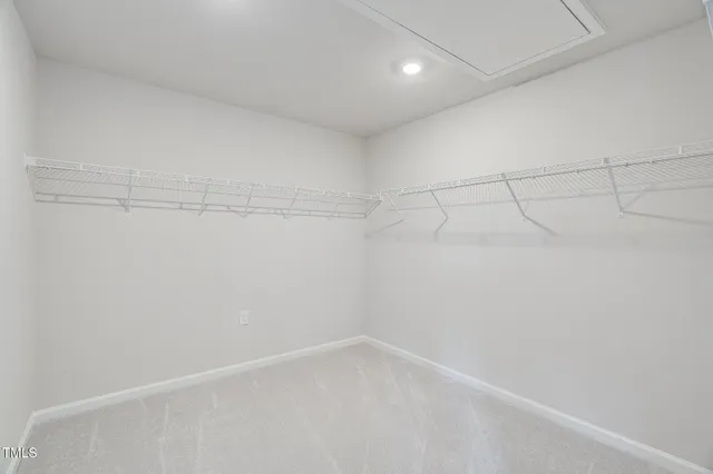 a view of a room with racks on the wall