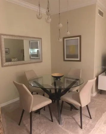 a view of a workspace with furniture