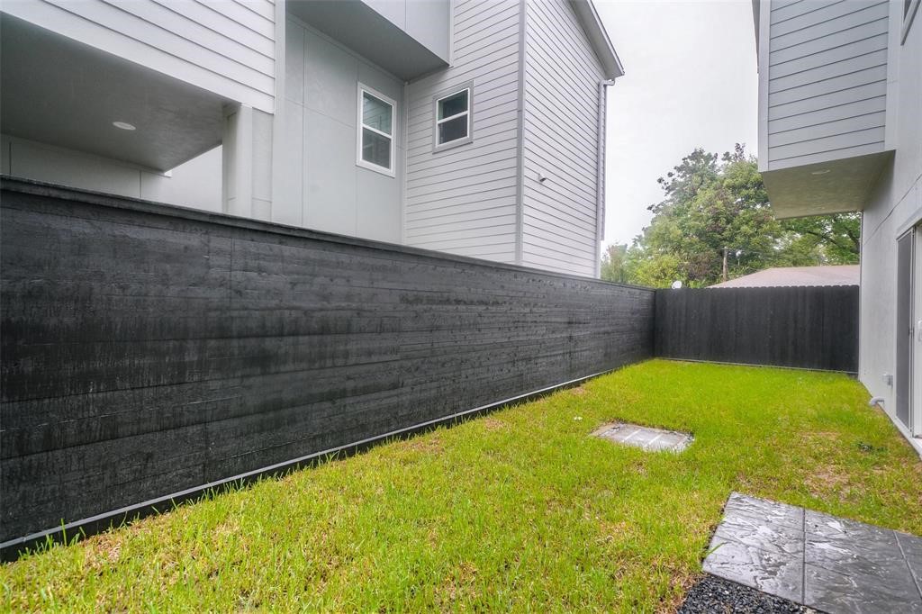 7714 Jacquelyn Oaks Road Houston, TX 77055 - Photo 2 of 19 Fenced yard **Photos are from previous listing**