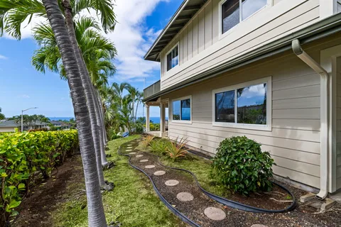 a backyard of a house with lots of green space