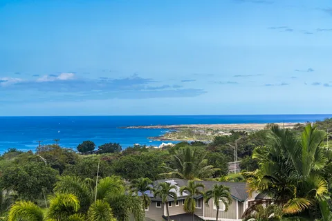 a view of a chairs and table in patio