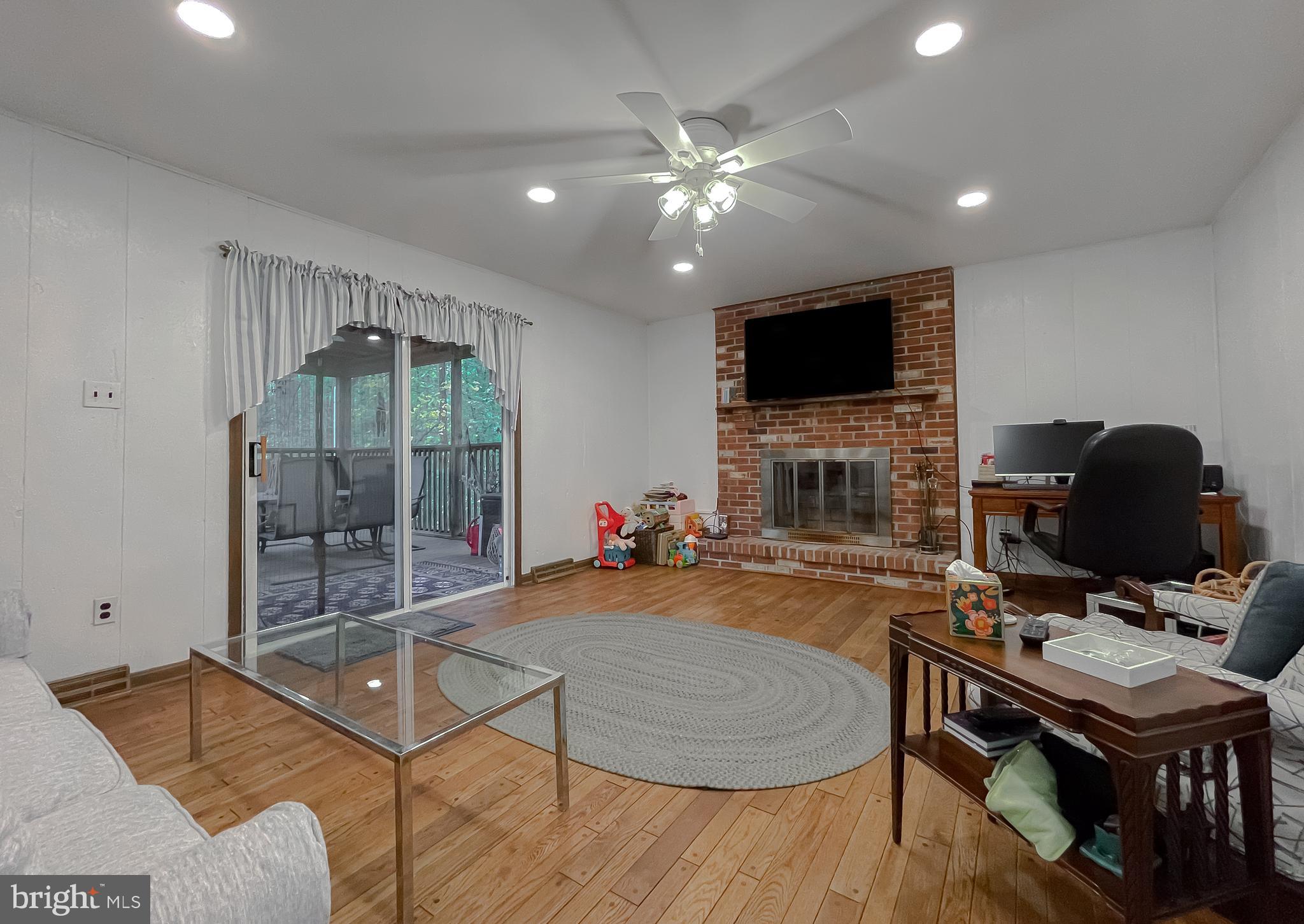 513 Clarks Run Road La Plata, MD 20646 - Photo 14 of 35 a room with furniture and a flat screen tv