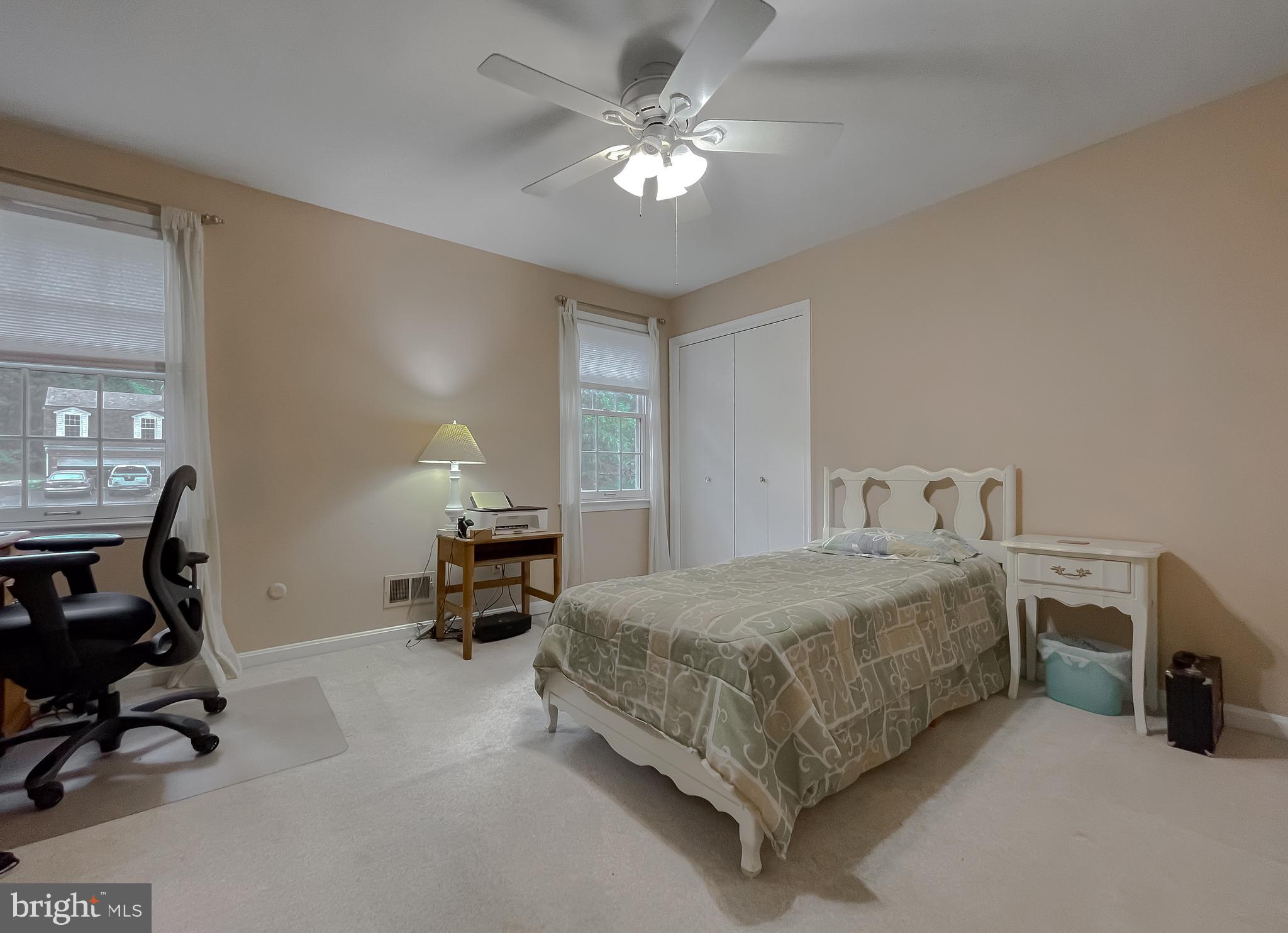 513 Clarks Run Road La Plata, MD 20646 - Photo 21 of 35 a bedroom with bed and a chandelier