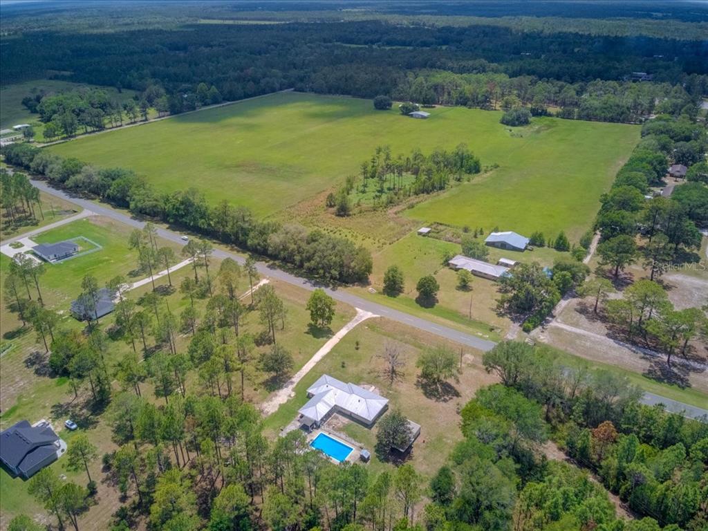 7422 County Road 231 Lake Butler, FL 32054 - Photo 54 of 57 an aerial view of a residential houses with outdoor space and street view