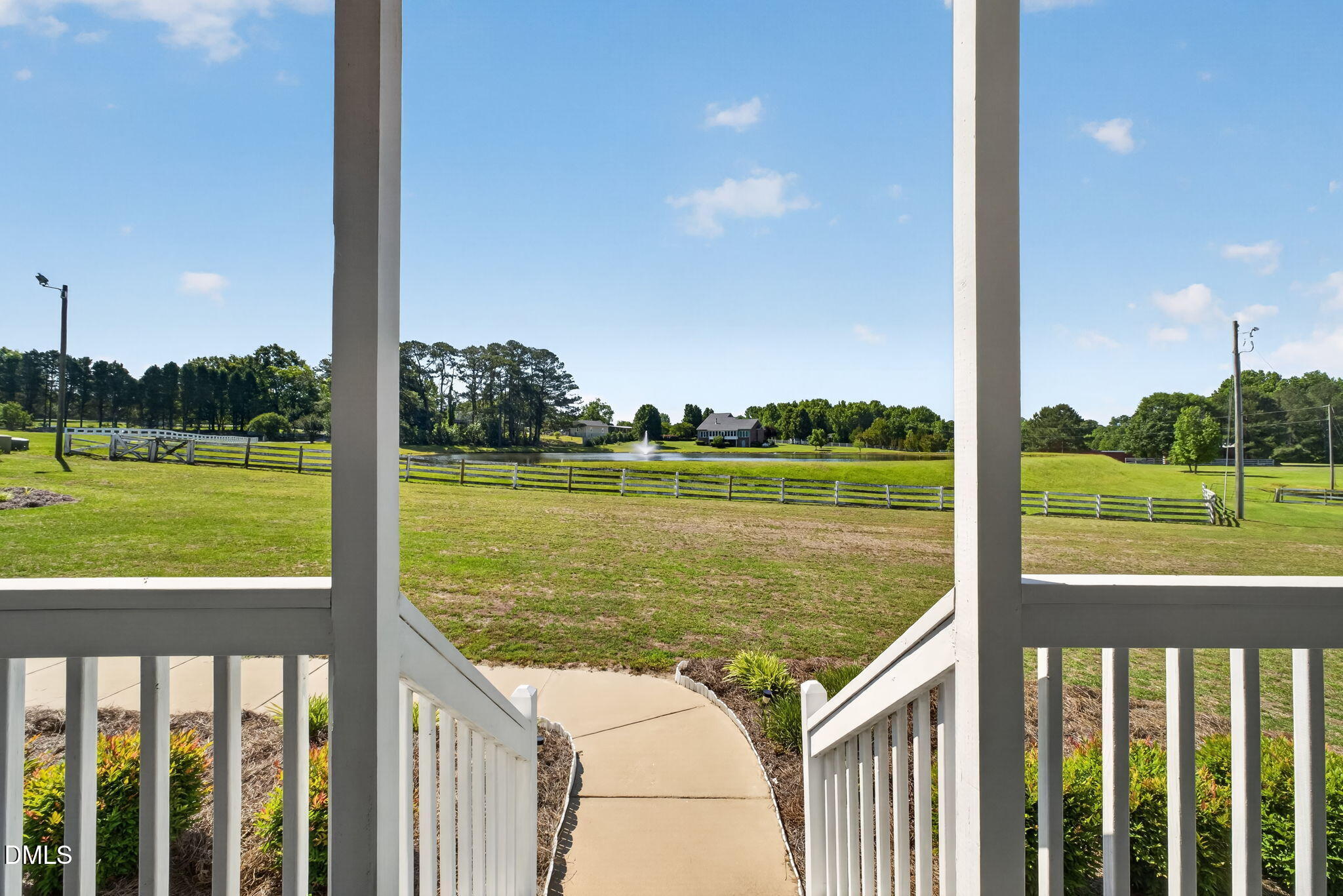 923 White Memorial Church Road Willow Spring, NC 27592 - Photo 11 of 46 a view of lake from a balcony with outdoor space