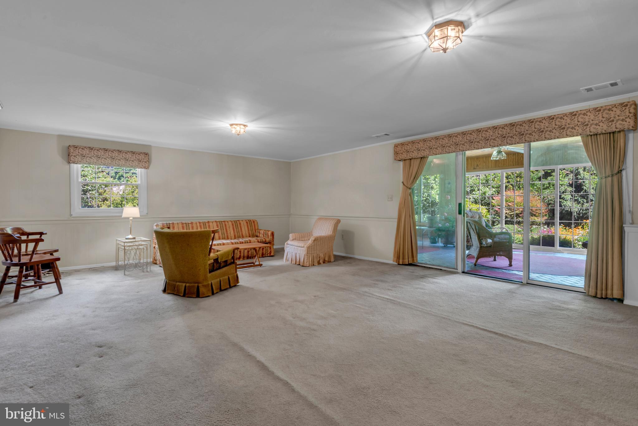 1702 Pot Spring Road Lutherville-Timonium, MD 21093 - Photo 29 of 39 Lower Level Family Room has access to Sun Room
