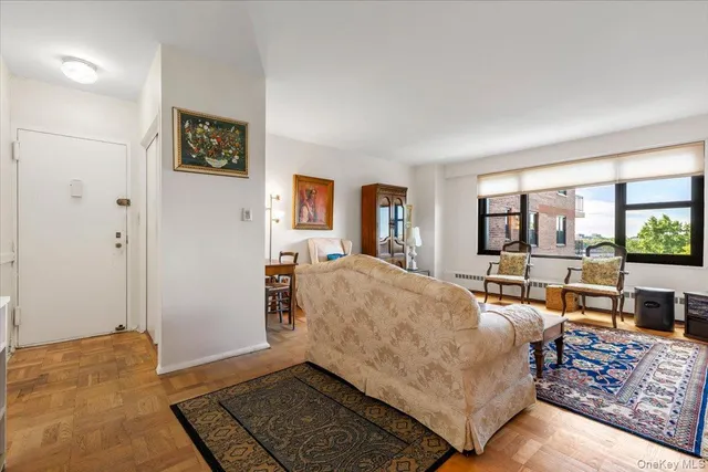 a living room with furniture and a rug