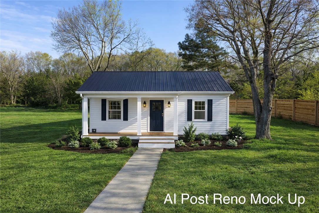 1307 East Park Drive Anderson, SC 29621 - Photo 11 of 12 Charming cottage with a welcoming front porch and manicured lawn.