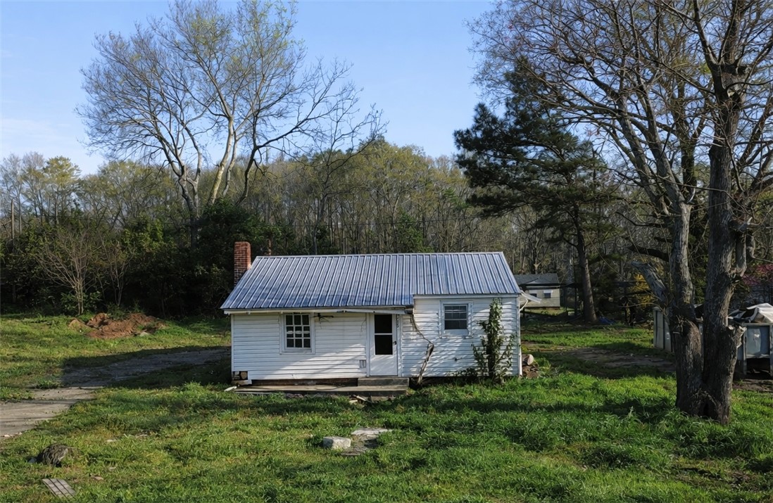 1307 East Park Drive Anderson, SC 29621 - Photo 2 of 12 This charming, modest home offers rustic appeal amidst a peaceful, natural setting.