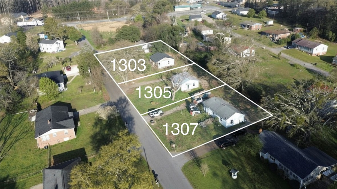 1307 East Park Drive Anderson, SC 29621 - Photo 4 of 12 This elevated perspective captures multiple properties with ample outdoor space and potential.