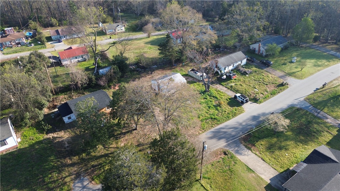 1307 East Park Drive Anderson, SC 29621 - Photo 5 of 12 An aerial perspective reveals the expansive layout of this property, highlighting its potential and surrounding landscape.