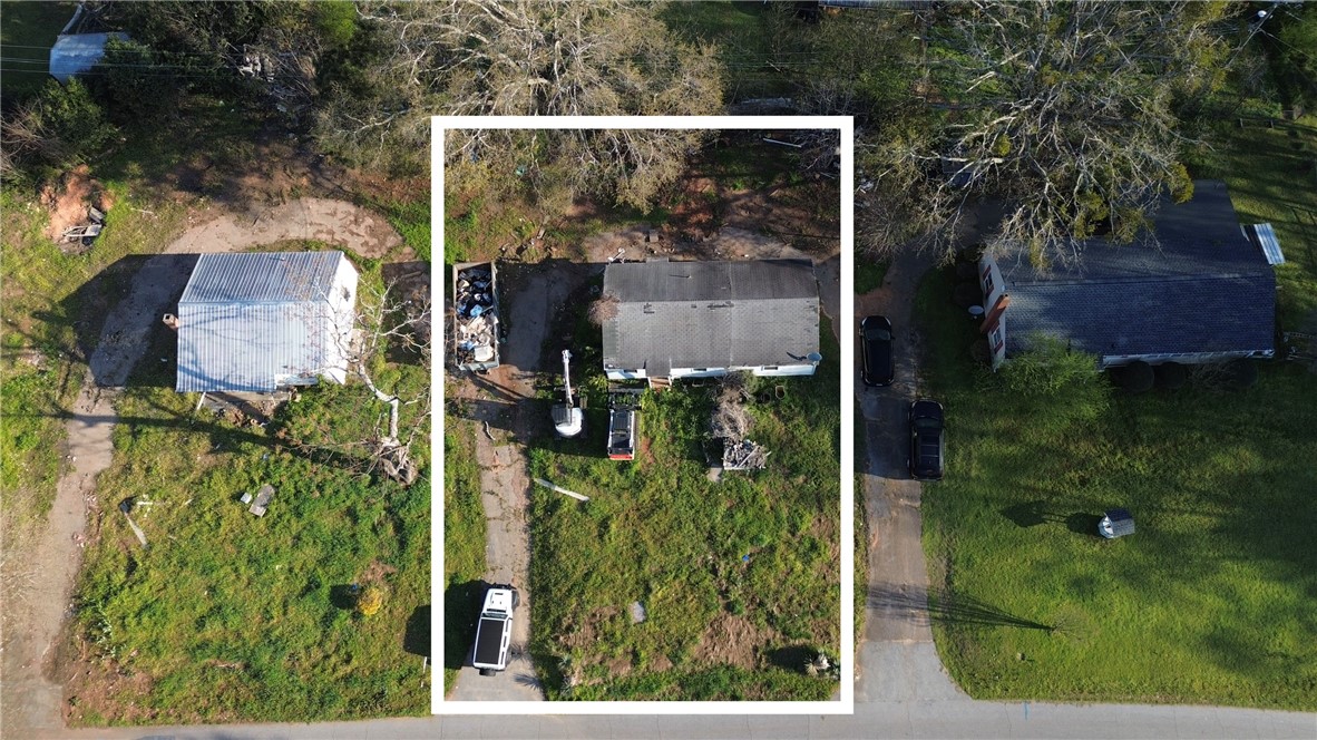 1307 East Park Drive Anderson, SC 29621 - Photo 7 of 12 Aerial view of a sprawling green lot with ample space.