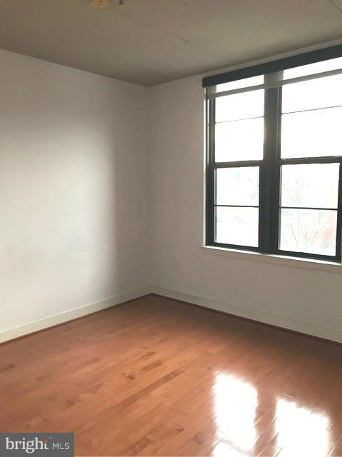 2125 14th Street Northwest, Unit 527 Washington, DC 20009 - Photo 11 of 20 an empty room with a window