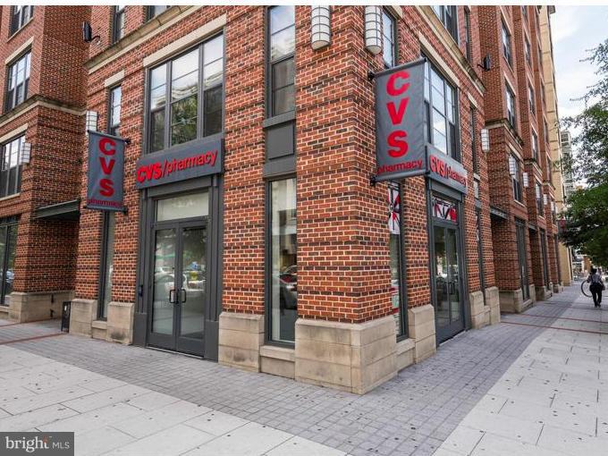 2125 14th Street Northwest, Unit 527 Washington, DC 20009 - Photo 20 of 20 a front view of a building with a red door
