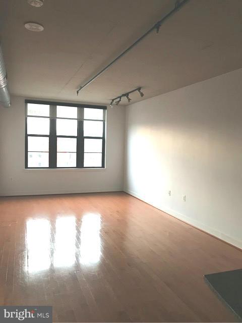 2125 14th Street Northwest, Unit 527 Washington, DC 20009 - Photo 10 of 20 a view of an empty room and a window