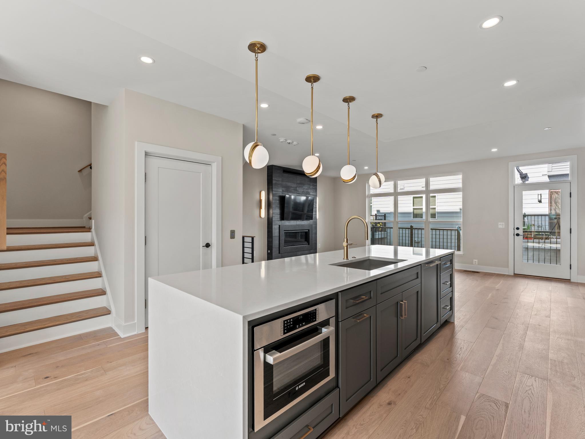 2015 Tysons Ridgeline Road Falls Church, VA 22043 - Photo 14 of 33 a kitchen with a sink and stove