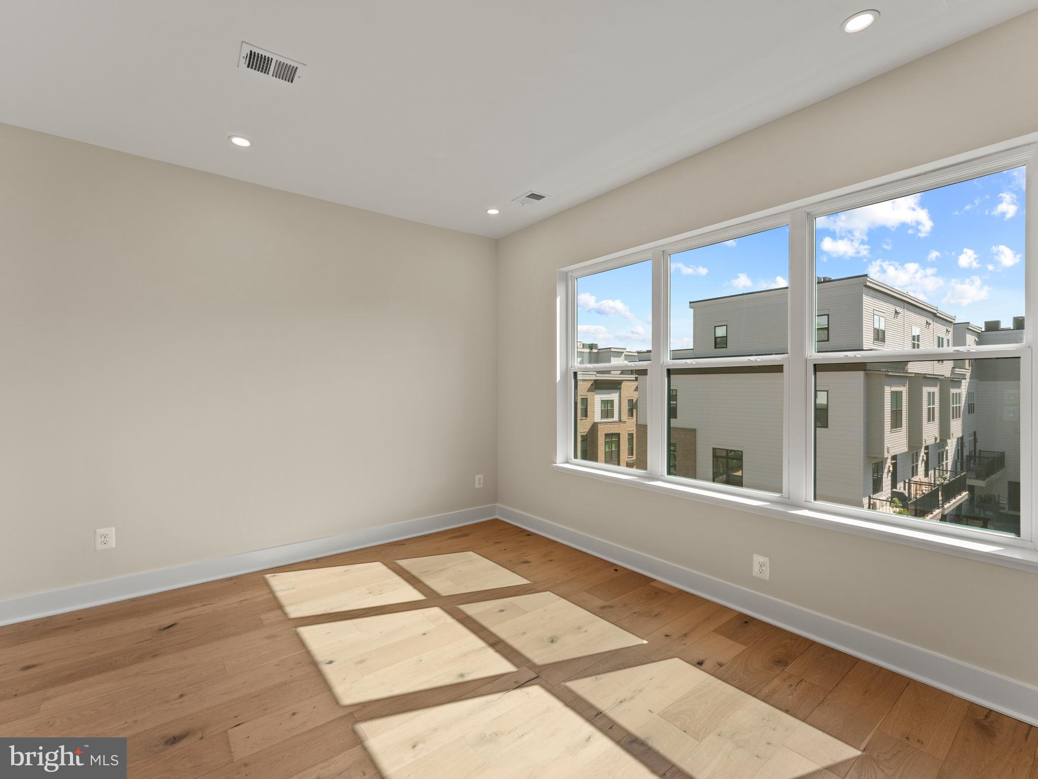 2015 Tysons Ridgeline Road Falls Church, VA 22043 - Photo 23 of 33 a view of an empty room with a window
