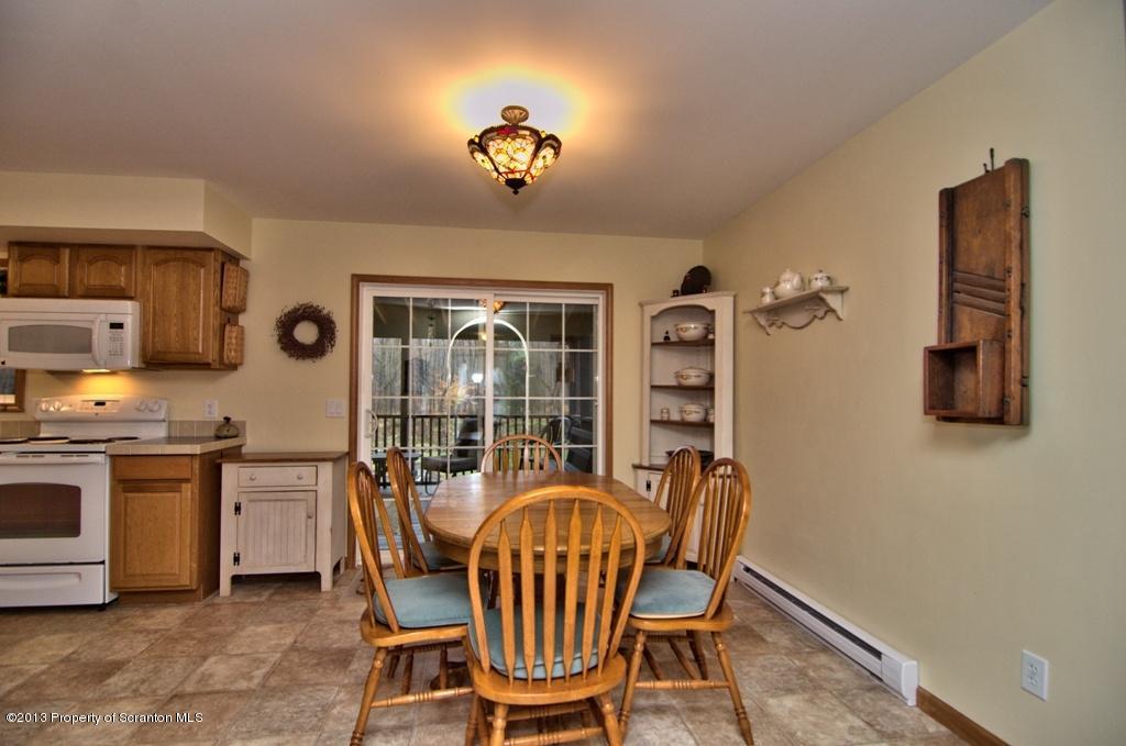 1633 Howe Road Moscow, PA 18444 - Photo 27 of 59 a dining room with furniture and window