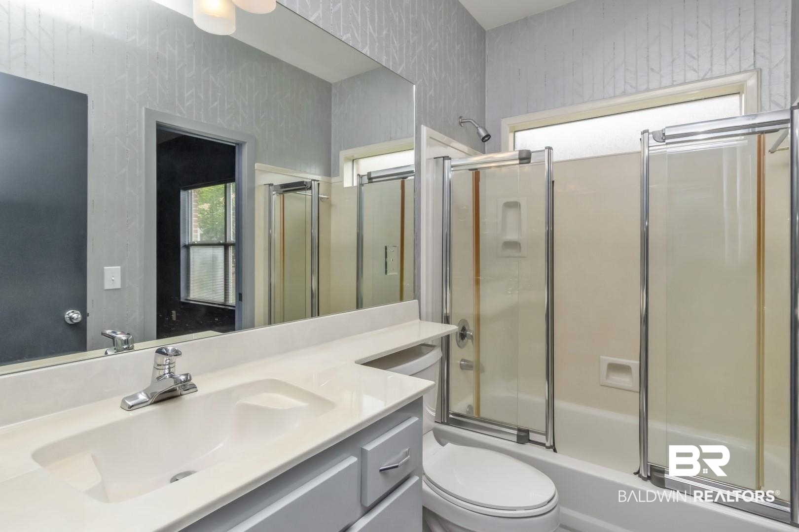 1205 Hillcrest Crossing East Mobile, AL 36695 - Photo 32 of 40 Full bathroom with vanity, enclosed tub / shower combo, and toilet