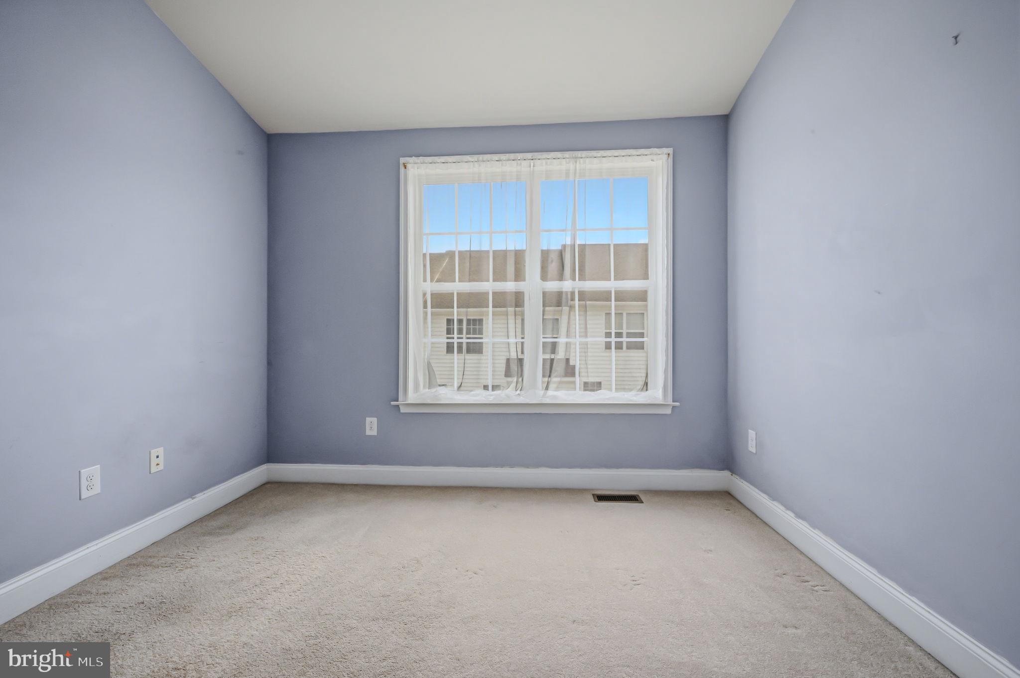 208 Jackdaw Alley, Unit 208 Springfield, PA 19064 - Photo 36 of 49 an empty room with a window