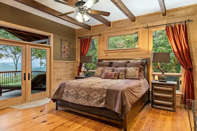 a dining room with furniture a flat screen tv and a clock