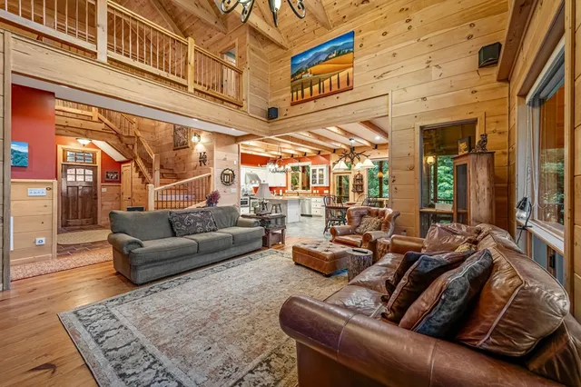 a view of a patio with wooden floor and outdoor seating