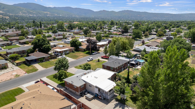 1489 North 400 West Bountiful, UT 84010 - Photo 46 of 47 Residential neighborhood with mature trees and mountain backdrop