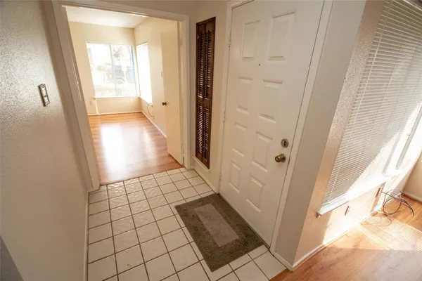 a view of an empty room and window