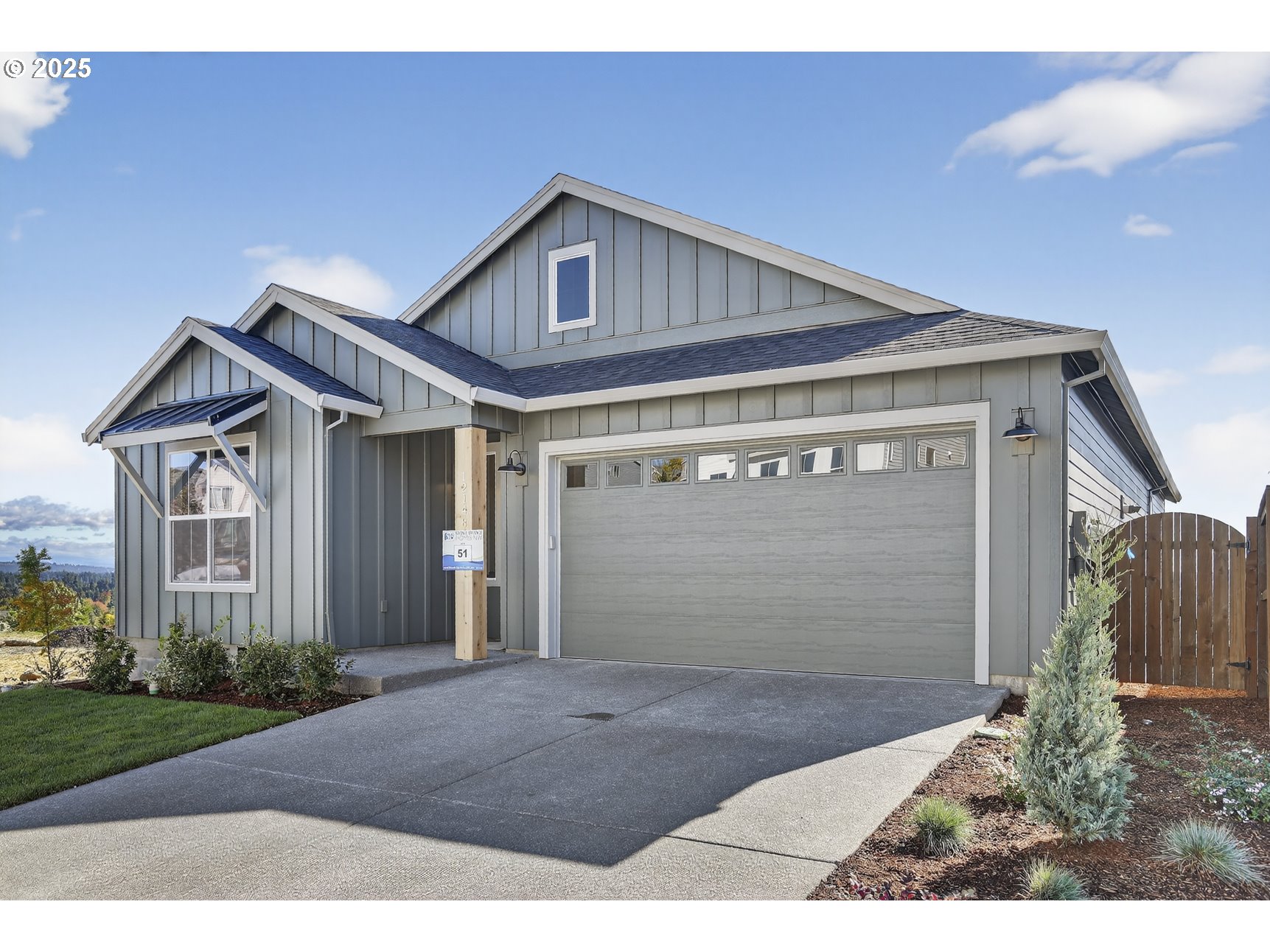 12122 Southwest Autumn View Street Tigard, OR 97224 - Photo 1 of 1 a front view of a house with a yard and garage