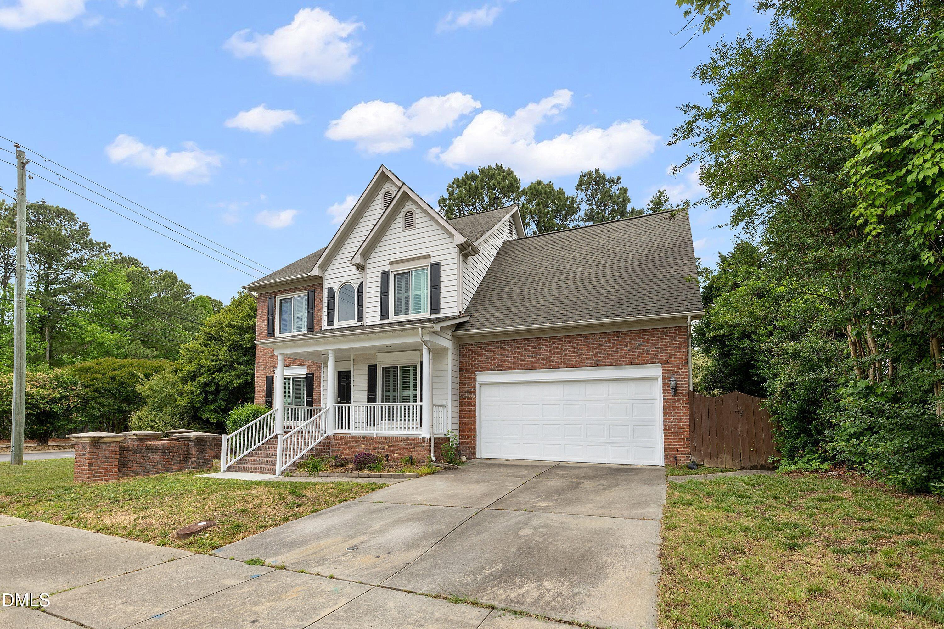 2428 Havershire Drive Raleigh, NC 27613 - Photo 3 of 53 a house view with a garden space