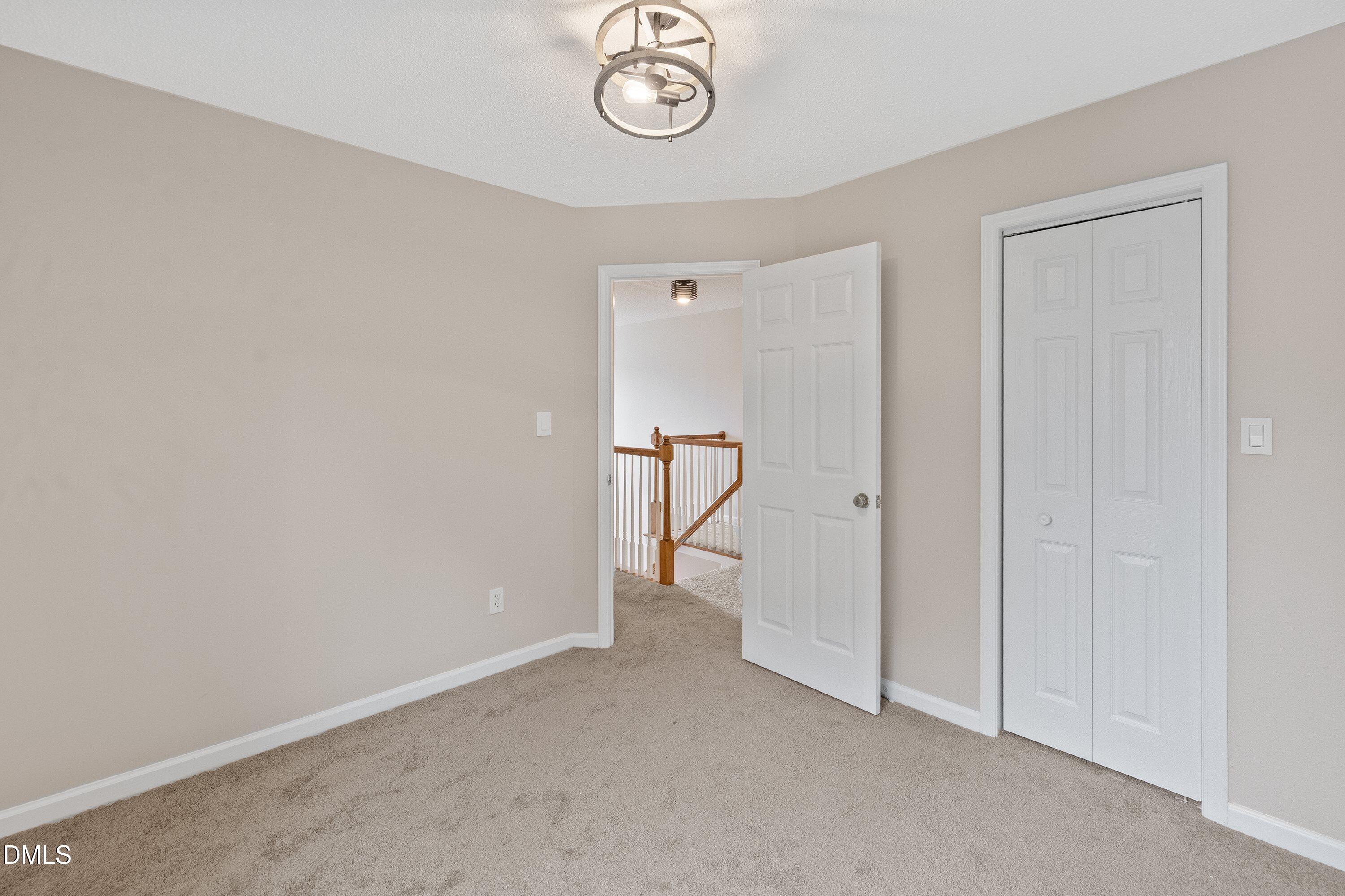 2428 Havershire Drive Raleigh, NC 27613 - Photo 38 of 53 a view of empty room with a window