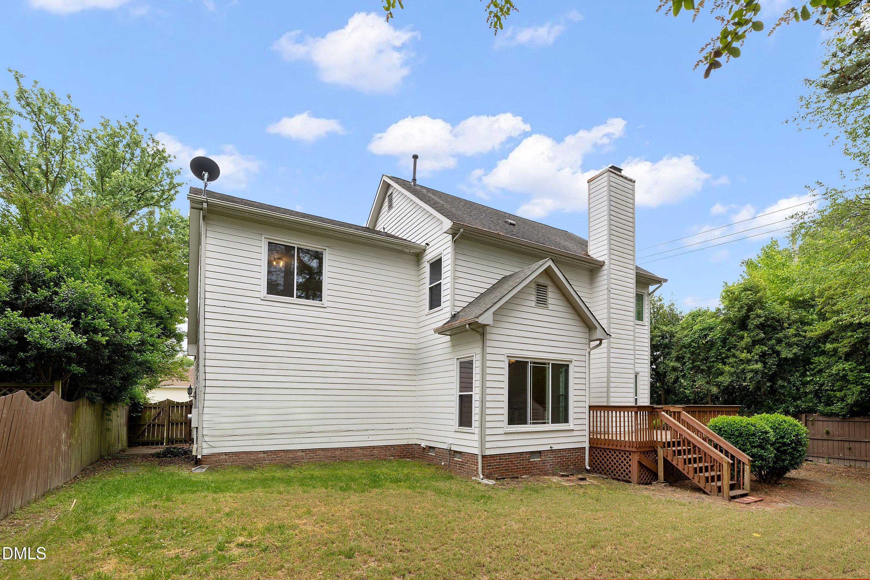 2428 Havershire Drive Raleigh, NC 27613 - Photo 50 of 53 a front view of a house with garden
