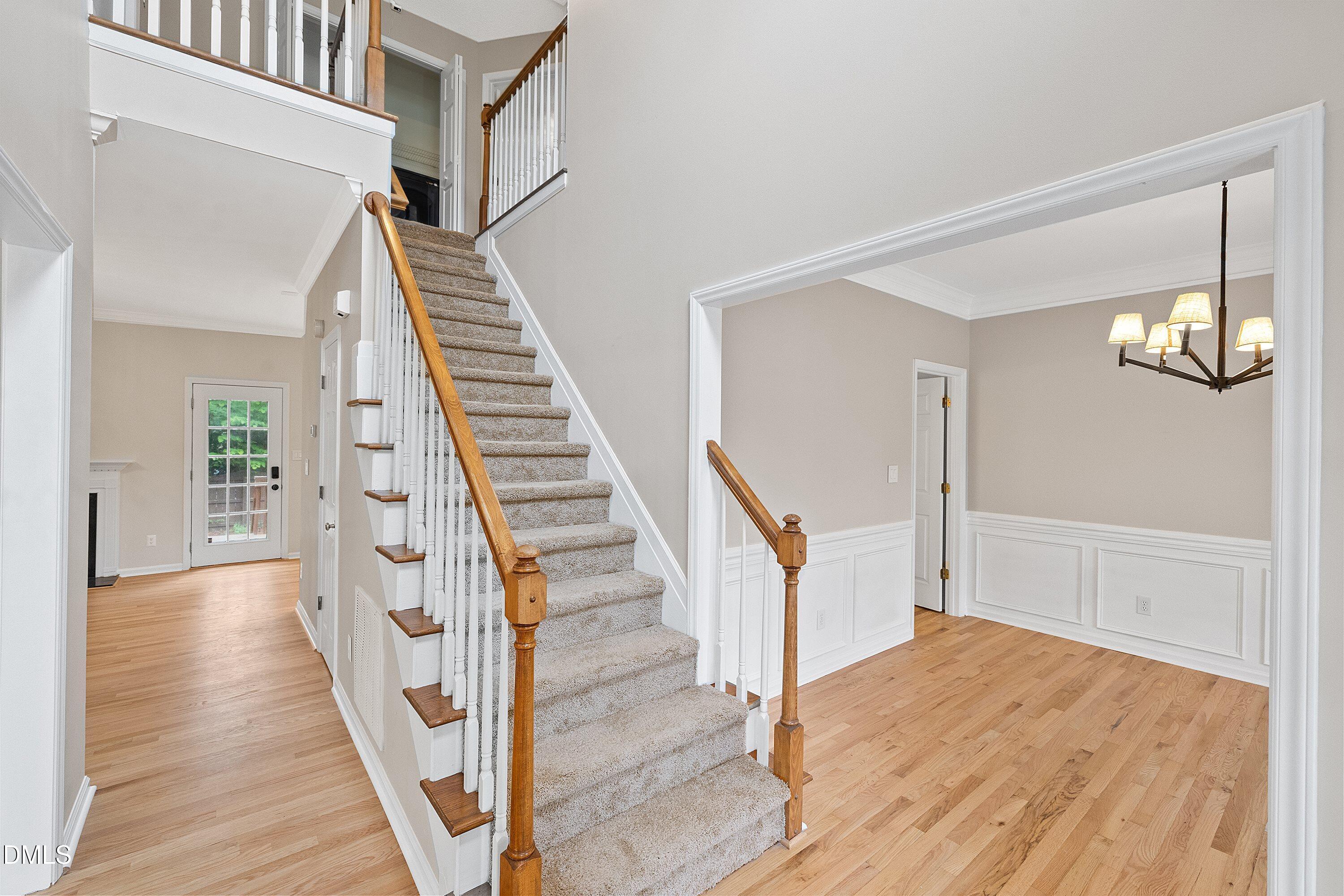 2428 Havershire Drive Raleigh, NC 27613 - Photo 9 of 53 a view of an entryway with wooden floor
