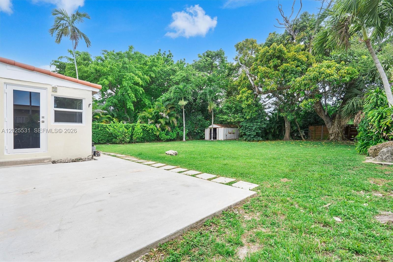 3951 Southwest 2nd Terrace, Unit 3951 Miami, FL 33134 - Photo 10 of 21 a view of a house with a yard