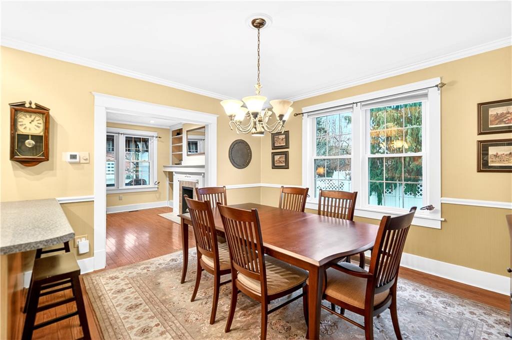 158 Market Street Beaver, PA 15009 - Photo 13 of 38 a view of a dining room with furniture window and wooden floor