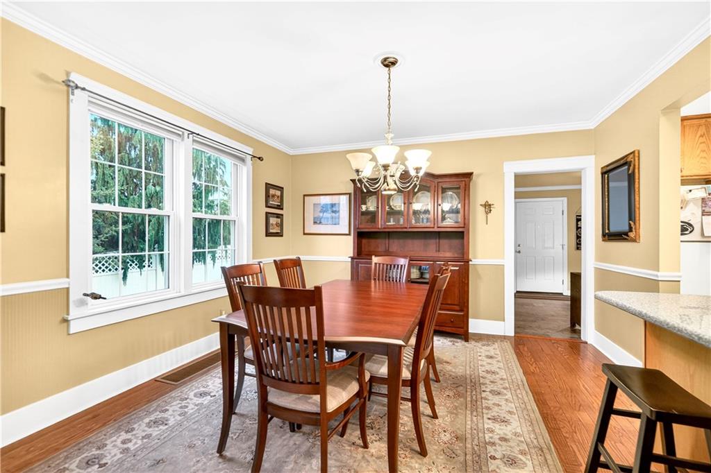 158 Market Street Beaver, PA 15009 - Photo 15 of 38 a view of a dining room with furniture window and wooden floor