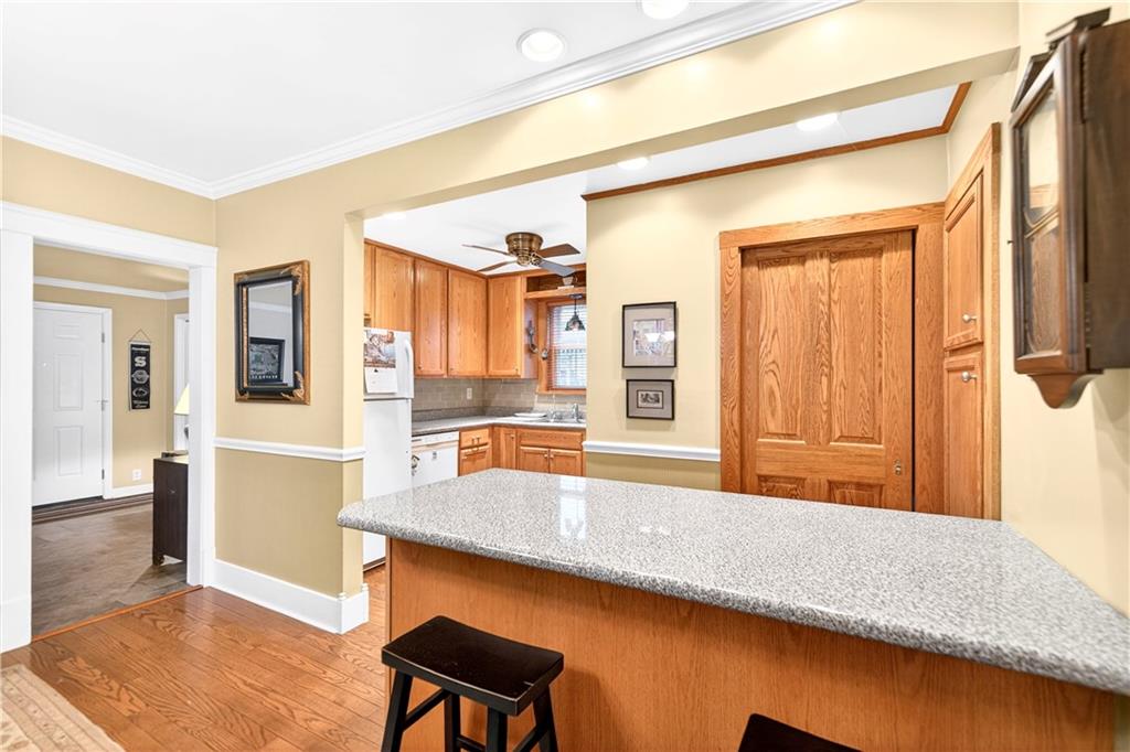 158 Market Street Beaver, PA 15009 - Photo 17 of 38 a hallway with a large window and dining table