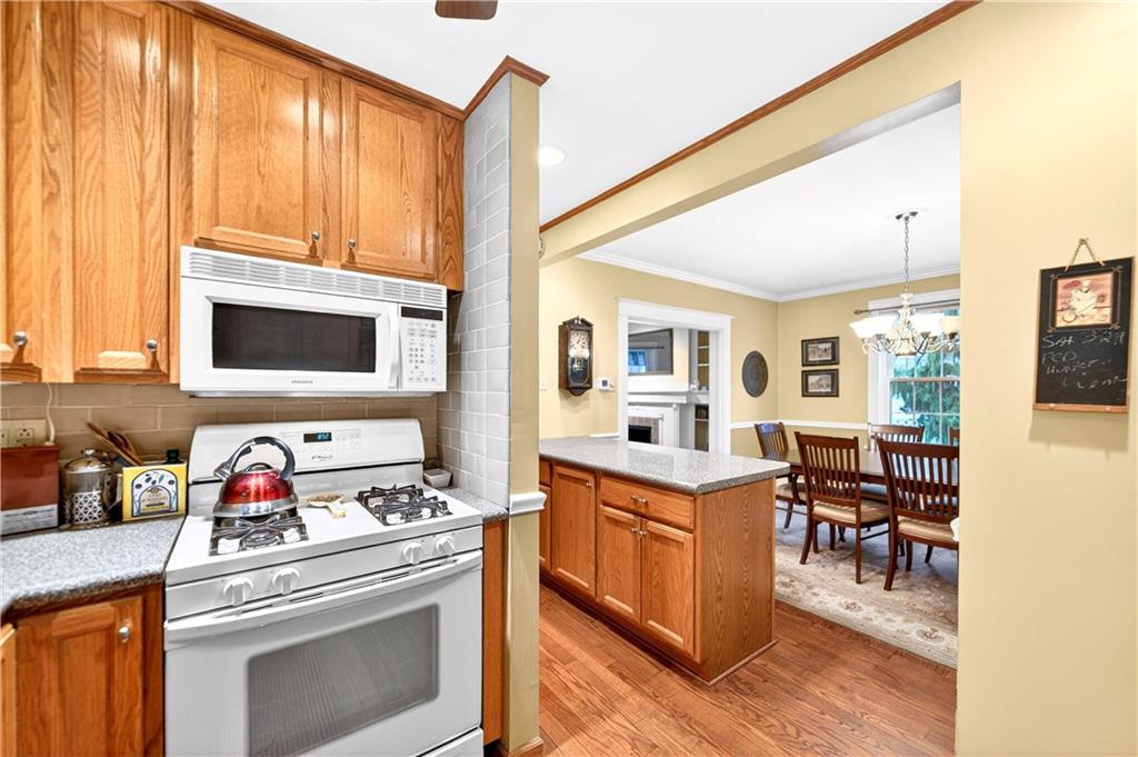 158 Market Street Beaver, PA 15009 - Photo 19 of 38 a kitchen with a stove and a microwave