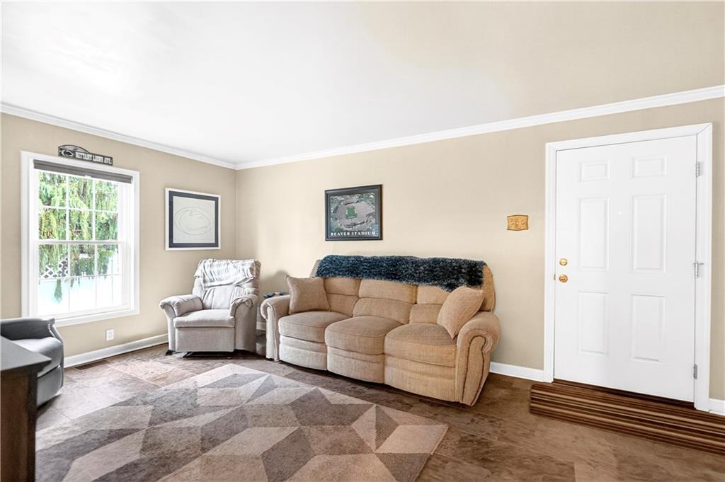 158 Market Street Beaver, PA 15009 - Photo 20 of 38 a living room with furniture and a window