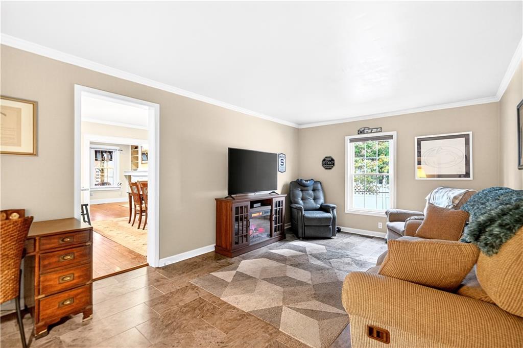 158 Market Street Beaver, PA 15009 - Photo 22 of 38 a living room with furniture and a flat screen tv